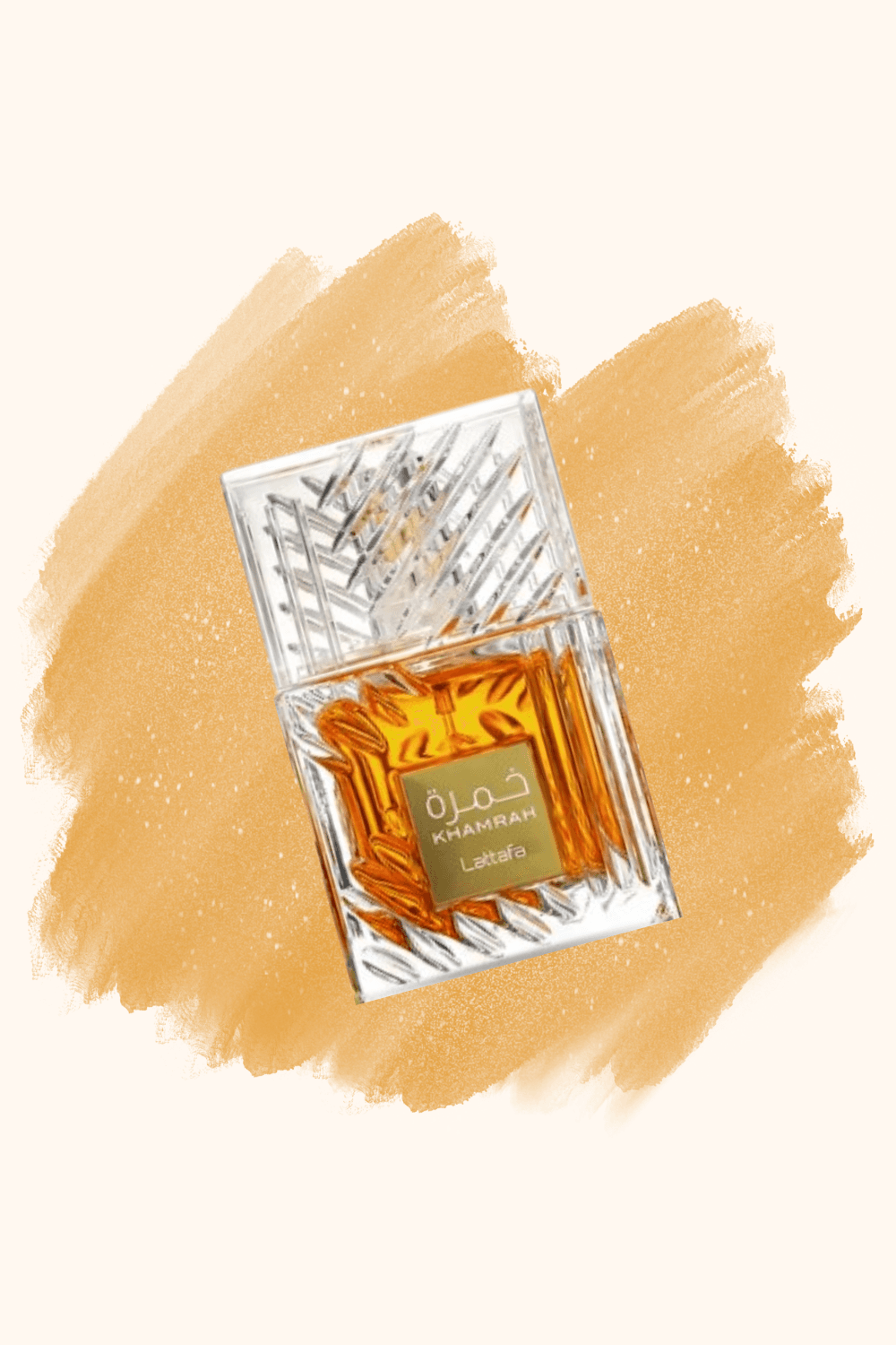 A Lattafa Khamrah eau de parfum bottle with an amber liquid on an orange brushstroke background