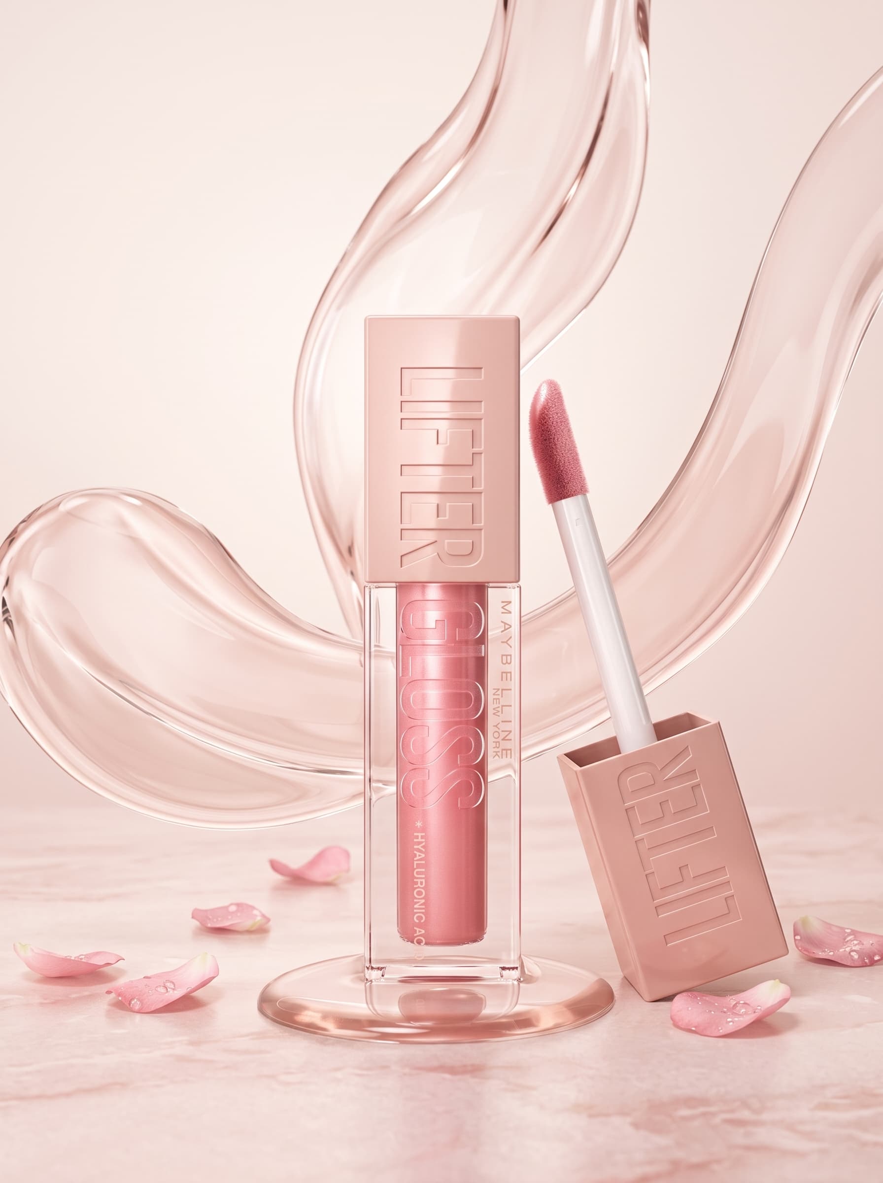 AI-generated image: a Maybelline Lifter Gloss tube and open wand among rose petals and ribbons of clear gloss